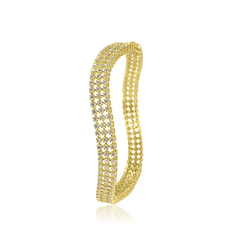 Uniquely shaped bangle in 18K Gold Diamonds